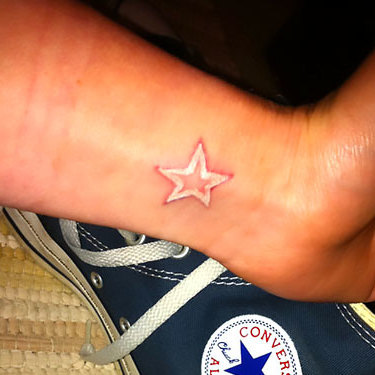White Star on Wrist Tattoo