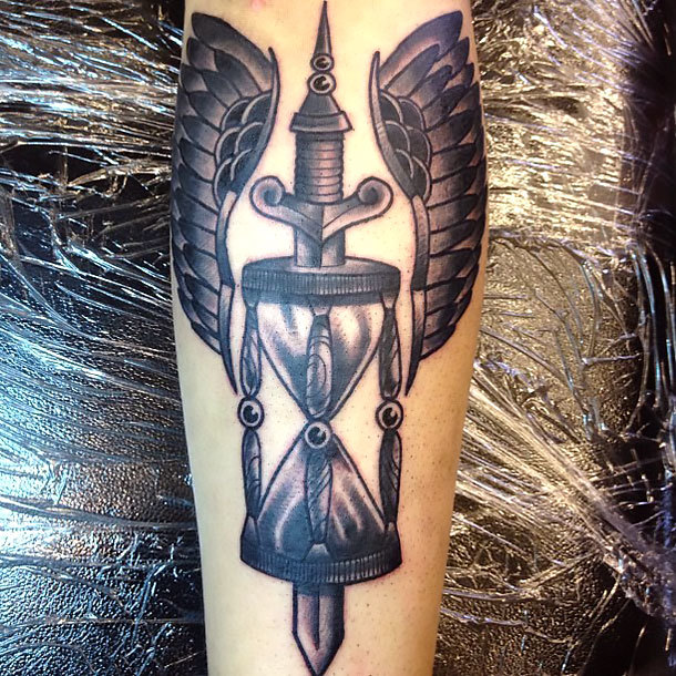Winged Hourglass on Shin Tattoo Idea