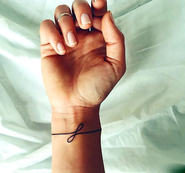 Wrap Around Wrist Tattoo Idea