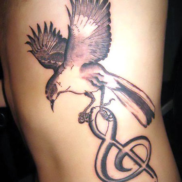 Mockingbird With Treble Clef Tattoo