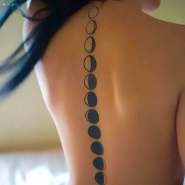 Moon Phases on Spine Tattoo