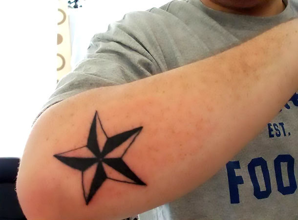 Nautical Star on Elbow Tattoo Idea