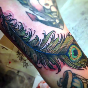 Neo Traditional Peacock Feather Tattoo