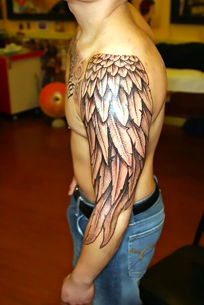 Nice Wing on Arm Tattoo Idea