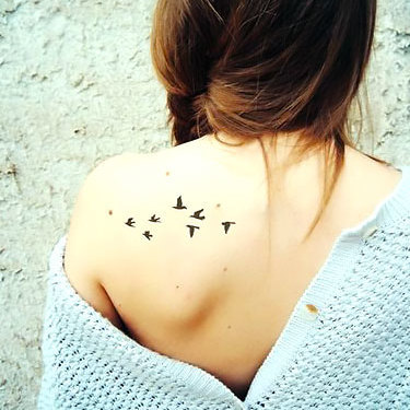 Tiny Birds on Shoulder Blade Tattoo