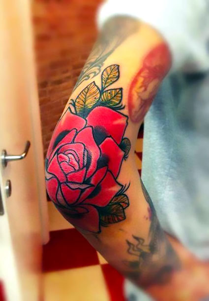 Traditional Rose on Elbow Tattoo Idea