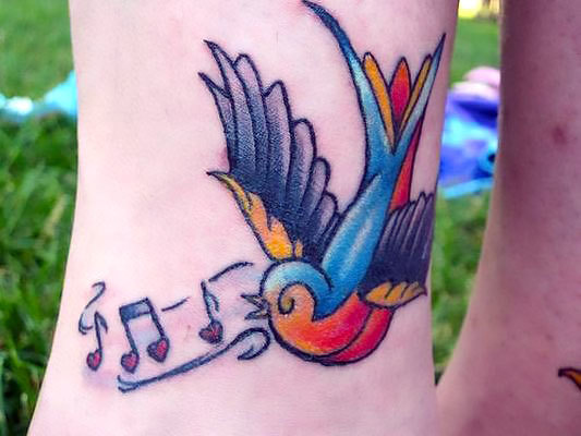 Traditional Songbird Tattoo Idea