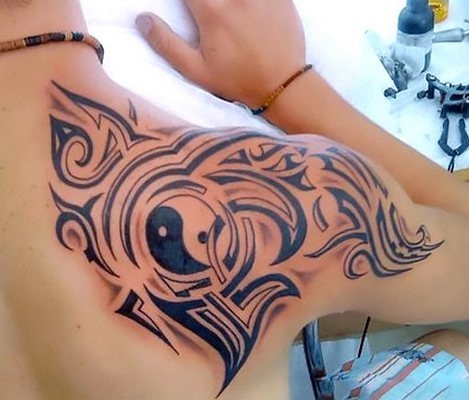 Tribal Men Shoulder Blade Tattoo Idea