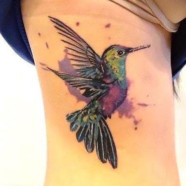 Awesome Hummingbird on Ribs Tattoo