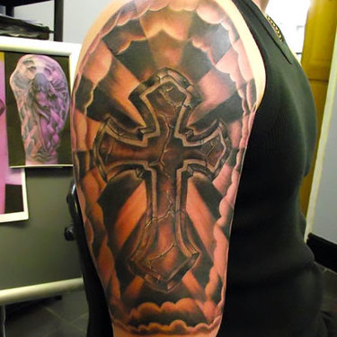 Religious Cross Half Sleeve Tattoo