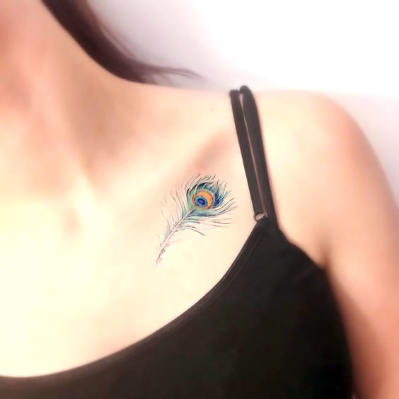 Peacock Feather on Collar Bone Tattoo Idea