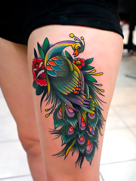 Peacock on Thigh Tattoo Idea