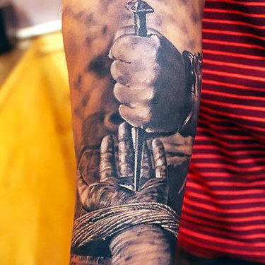Religious Forearm Tattoo