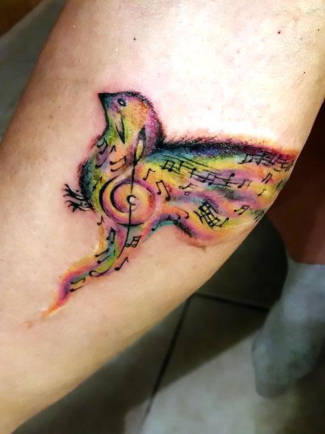 Awesome Small Songbird on Forearm Tattoo Idea