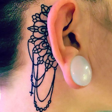 Femine Lines Behind Ear Tattoo