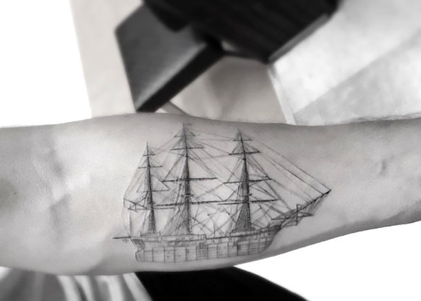 Fine Line Ship Tattoo Idea