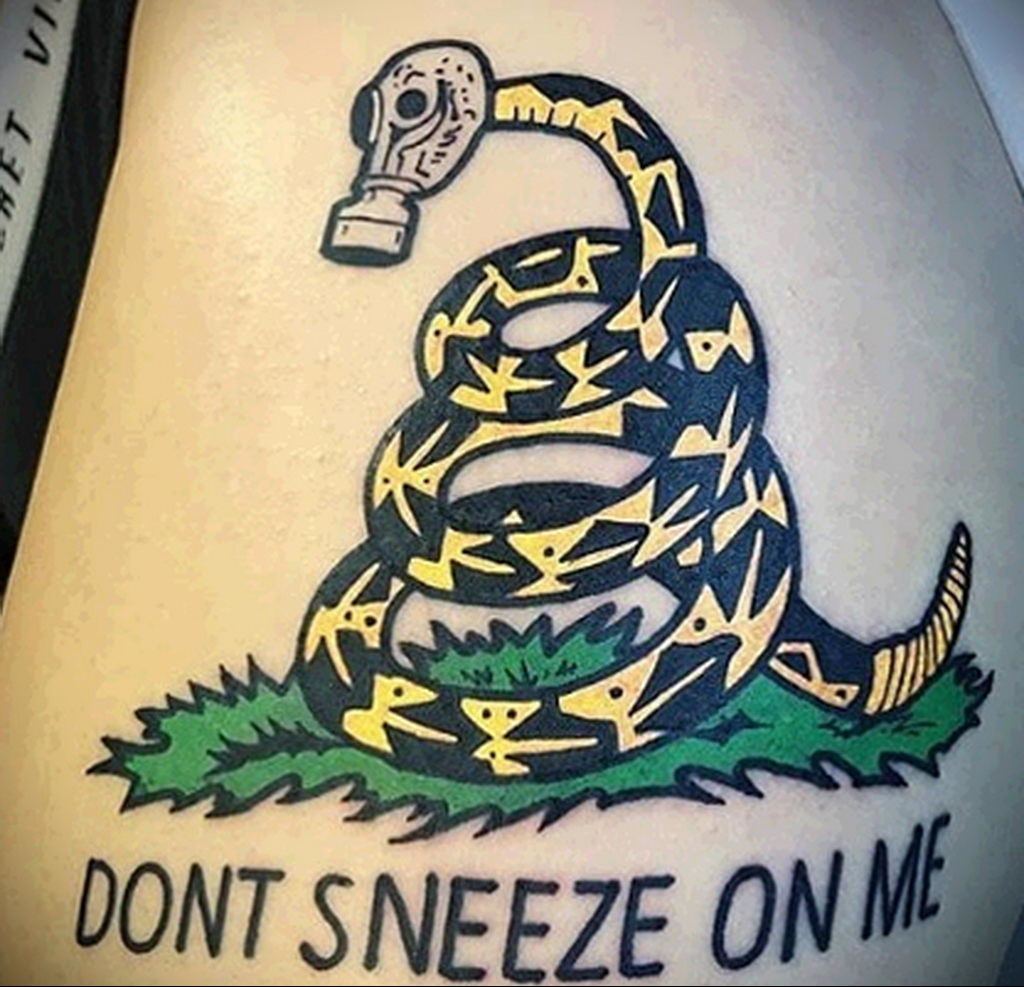 Snake In Gas Mask Tattoo Idea