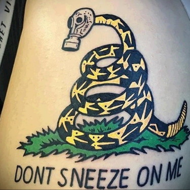 Snake In Gas Mask Tattoo