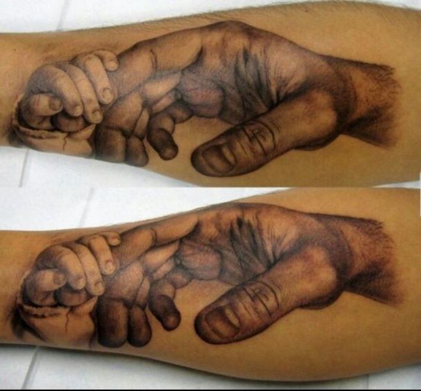 Father and Child Hands Tattoo Idea