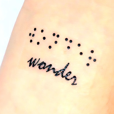 Creative Word Wonder Tattoo