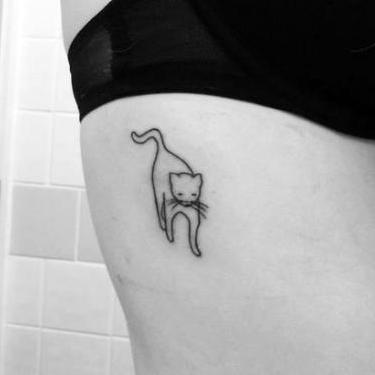 Cat Outline on Ribs Tattoo