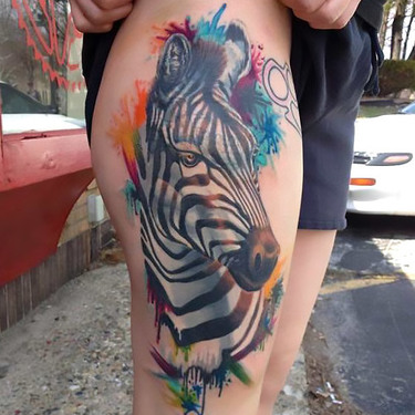 Colorful Zebra on Thigh Tattoo