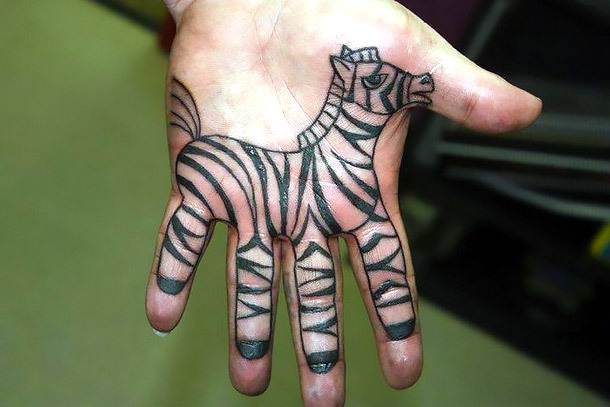 Zebra on Palm Tattoo Idea