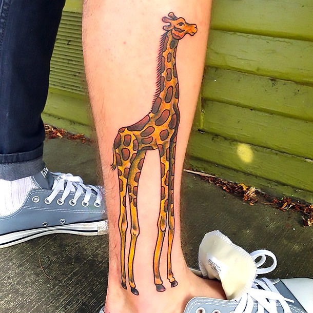Giraffe Tattoo on Leg Tattoo Idea