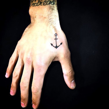 Small Anchor on Hand Tattoo