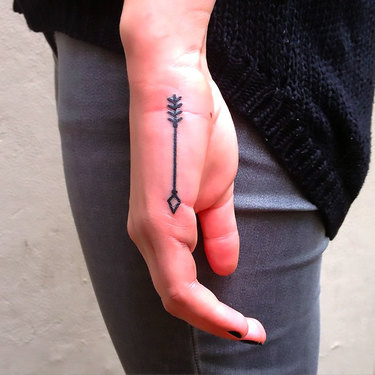 Small Arrow on Hand Tattoo