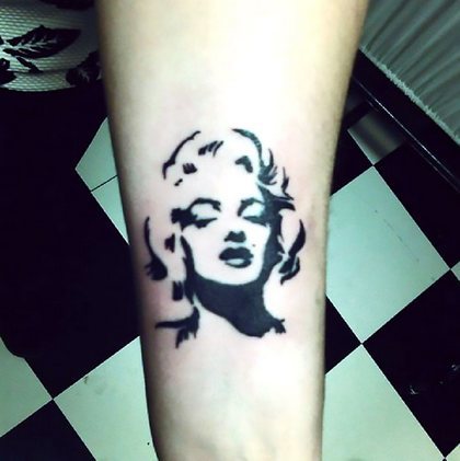 Small Marilyn Monroes Portrait Tattoo Idea