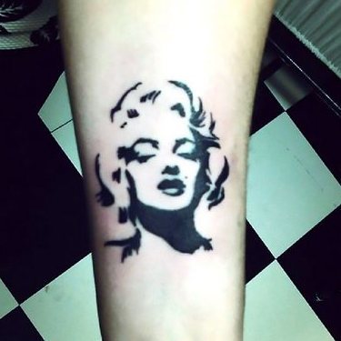 Small Marilyn Monroes Portrait Tattoo