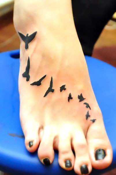 Small Black Birds on Foot Tattoo Idea