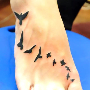Small Black Birds on Foot Tattoo