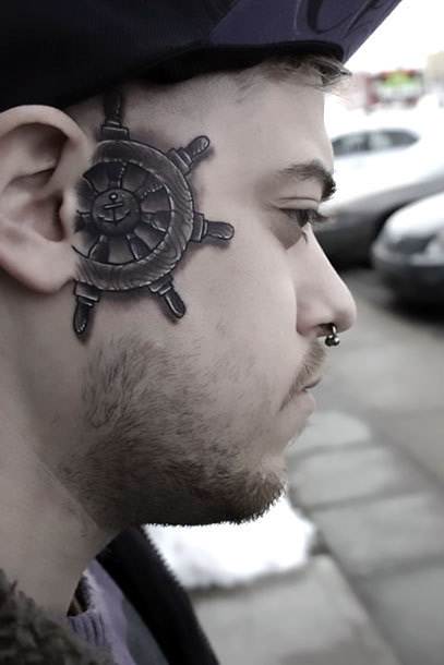 Small Helm Face Tattoo Idea