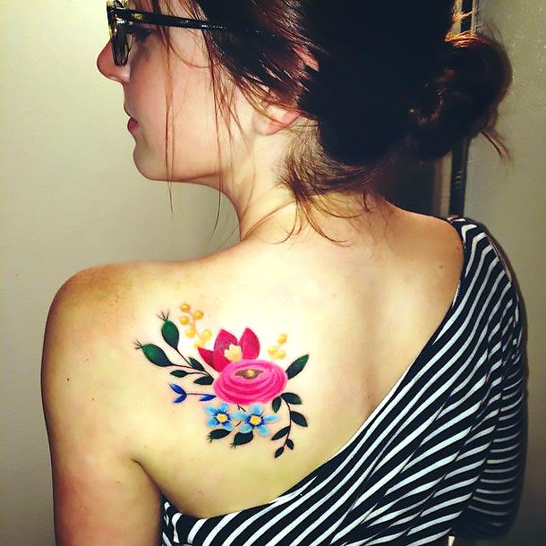 Flowers on Shoulder Blade Tattoo Idea