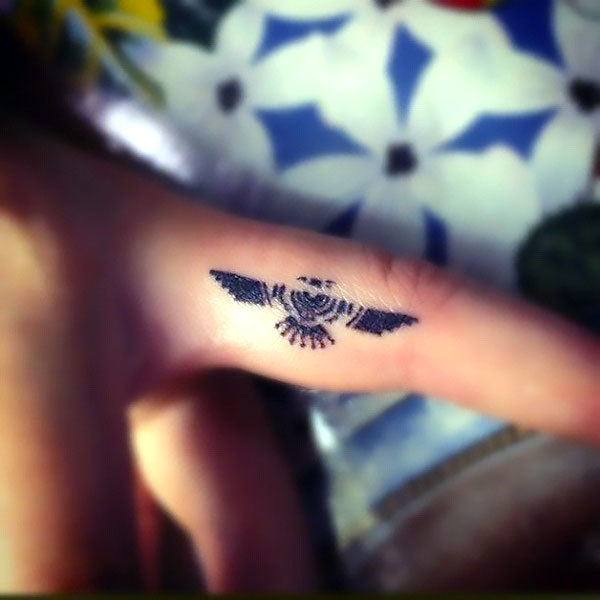 Small Thunderbird on Finger Tattoo Idea