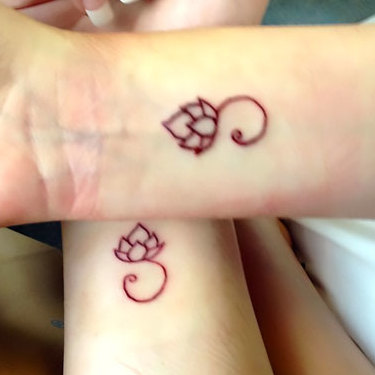 Small Lotus Wrist  Tattoo