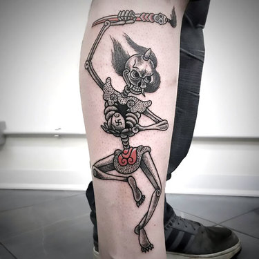 Skeleton on Calf Tattoo