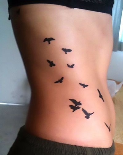 Flock of Birds on Side Tattoo Idea
