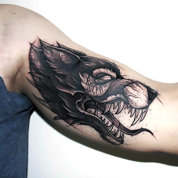 Best Sketch Style Wolf Tattoo on Bicep Tattoo Idea