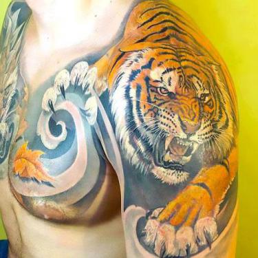 Amazing Tiger on Chest and Shoulder Tattoo