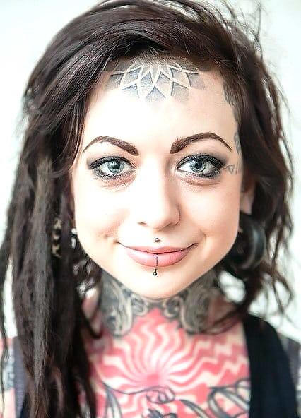 Cute Dotwork forehead Tattoo Idea
