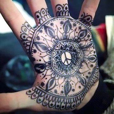 Peace Symbol on Palm Tattoo