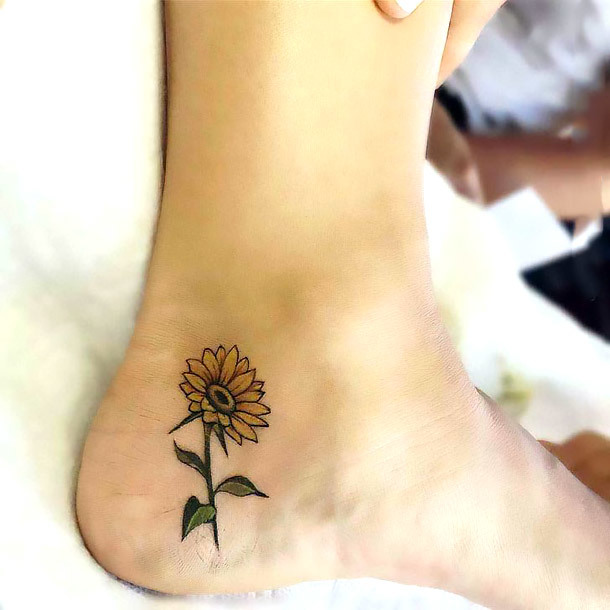 Side of Heel Sunflower Tattoo Idea