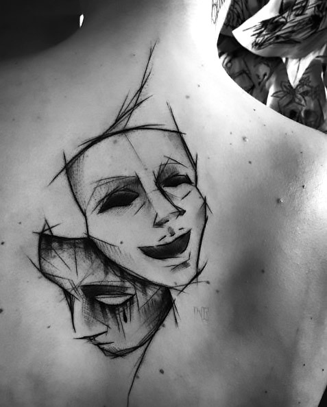 Sketch Style Mask Tattoo Idea