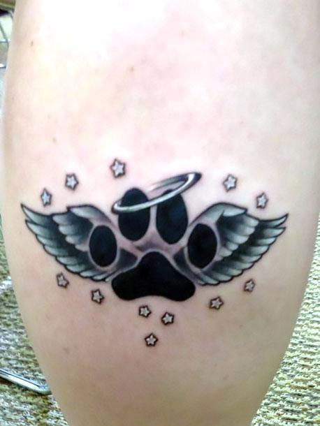 In memory of my Pug Paw print with Angel Wings and a Halo tattoo  Wings  tattoo Paw tattoo Dog paw tattoo