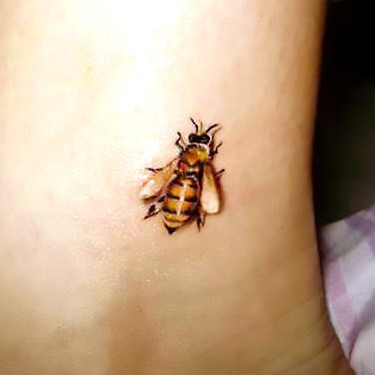 Realistic Little Bee Tattoo