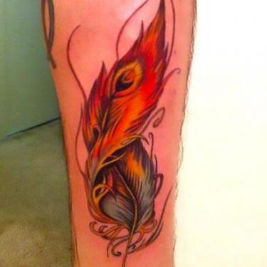 Beautiful Red Feather Tattoo