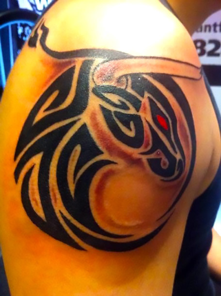 Tribal Bull With Red Eye Tattoo Idea